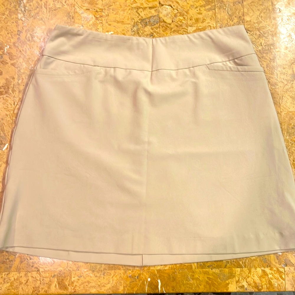 Tail golf skort, poly spandex, tummy control, shorts built in 4 pockets, slip on